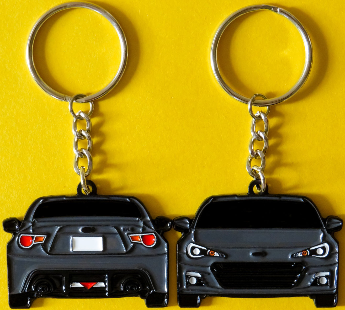JDM Subaru BRZ 2-Sided Keychain For a lanyard or jet tag, Precision-Crafted Design, Perfect for BRZ Enthusiasts, Sports Car Fans, and Automotive Aficionados. Elevate Your Keys and fob cover with BRZ Style and Performance, An Essential Accessory for BRZ Scion FRS and GT86 Owners. Makes for a great gift or accessory for him, her, dad, mom, father, mother, boyfriend, and girlfriend.
