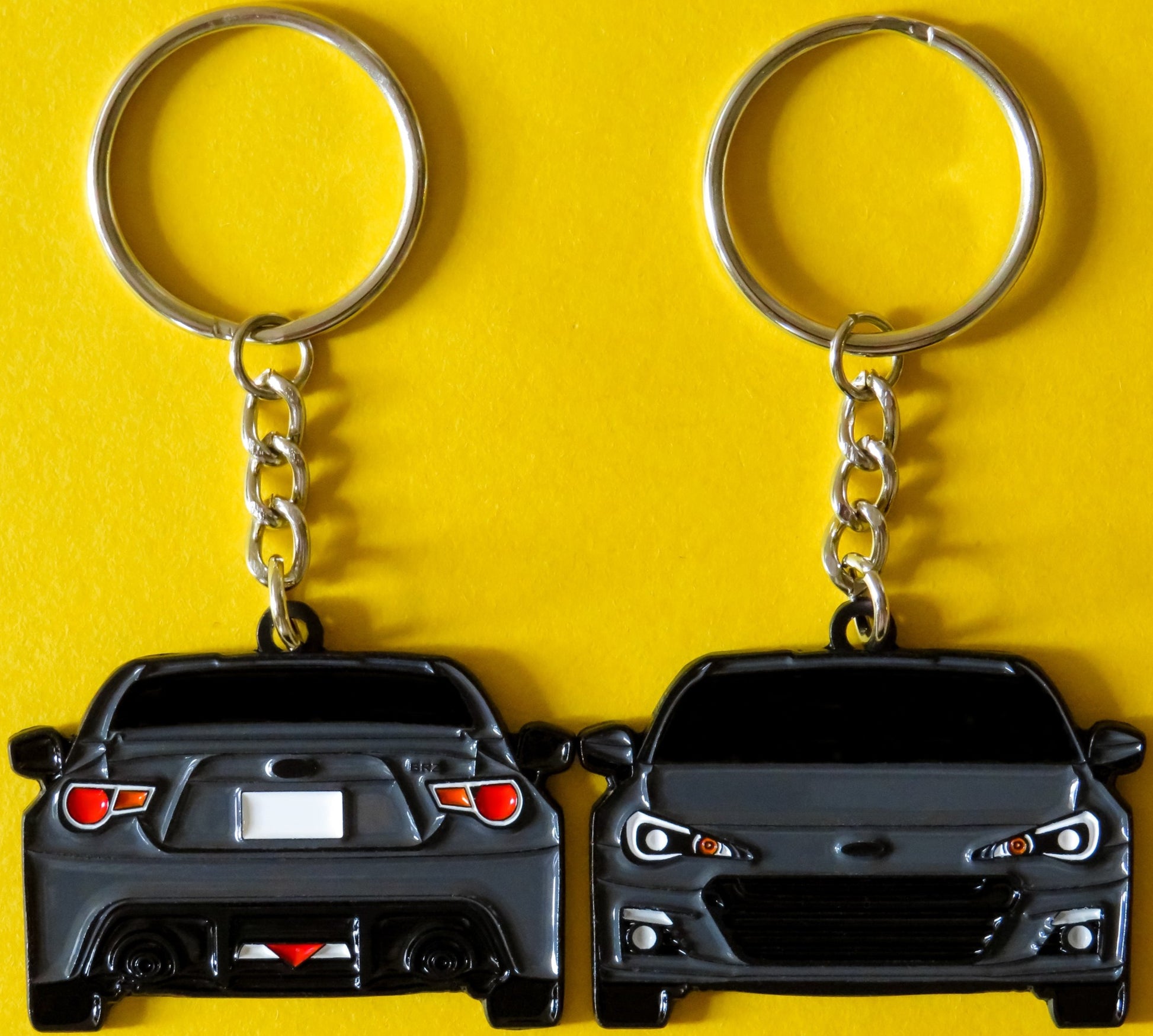 JDM Subaru BRZ 2-Sided Keychain For a lanyard or jet tag, Precision-Crafted Design, Perfect for BRZ Enthusiasts, Sports Car Fans, and Automotive Aficionados. Elevate Your Keys and fob cover with BRZ Style and Performance, An Essential Accessory for BRZ Scion FRS and GT86 Owners. Makes for a great gift or accessory for him, her, dad, mom, father, mother, boyfriend, and girlfriend.