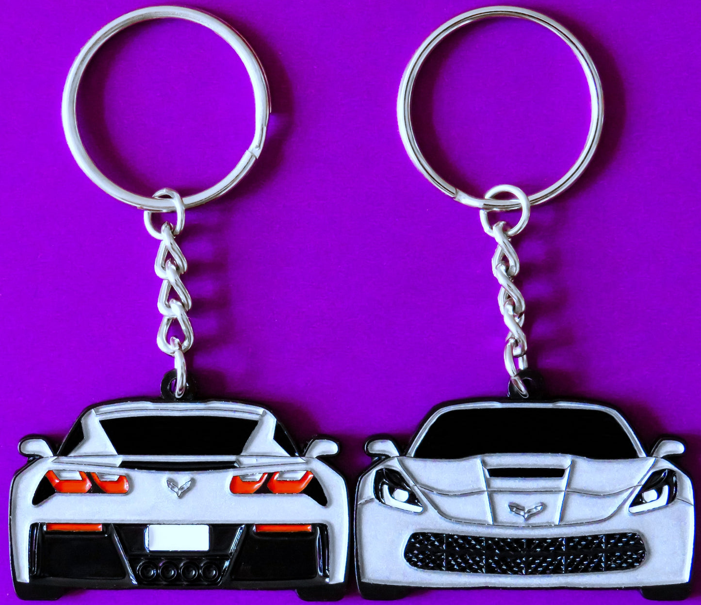 Silver Chevrolet Chevy C7 Corvette Stingray Z06 ZR1 Keychain Gift For Car Enthusiasts, Car Guys, Gearheads, Father, Dad, Mother, Mom, Boyfriend, Him, Girlfriend, Her, and more. American muscle car enamel pin patch unique gift idea. Jet tag key ring that fits on a key fob cover for Chevy owners and fans.