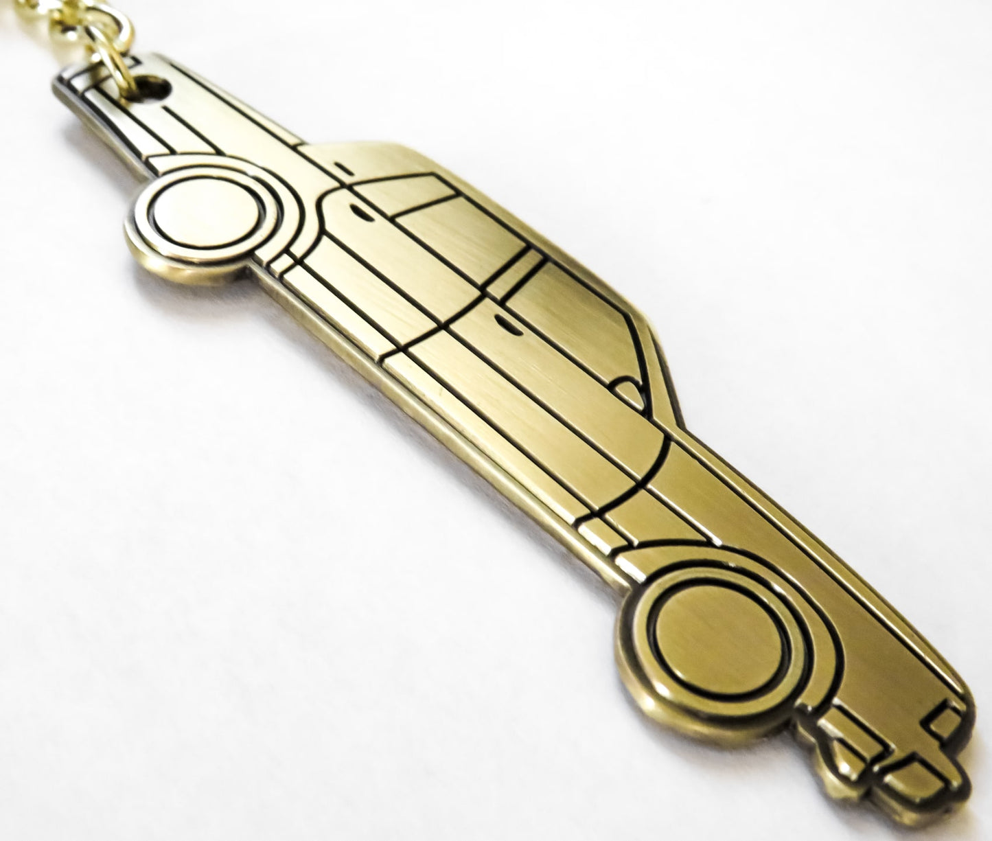 Cool Silhouette Keychain For A Classic Box Chevy Caprice Brougham Donk Lowrider. Great gift for husband mother father dad mom him her boyfriend girlfriend along with car enthusiasts fans and owners. Fits on a key fob and also works well as a keyring and lanyard emblem