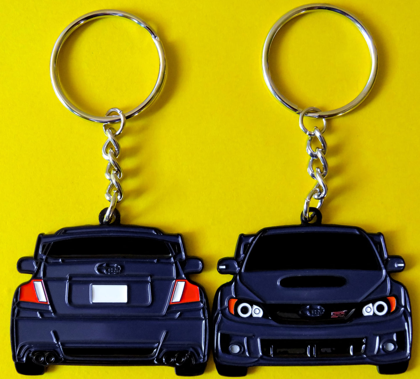 Plasma Blue Subaru WRX STI 2-Sided Keychain that fits on a key fob, Precision-Crafted Design, Ideal for WRX STI Enthusiasts, Rally Car Lovers, and Automotive Fans. Elevate Your Keys with WRX STI Style and Unmatched Performance, A Must-Have Accessory for Subaru WRX STI Owners. A great gift for owners, fans, him, her, boyfriend, girlfriend, mom, dad, father, mother, and more!