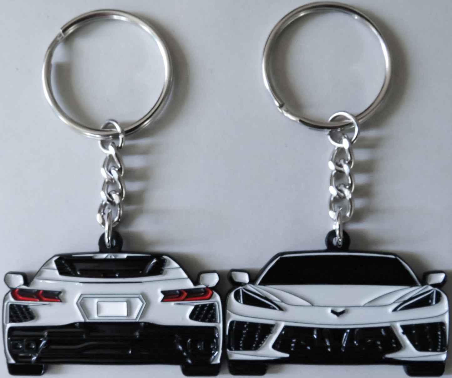 Gray Chevrolet Chevy C8 Corvette Stingray Z06 ZR1 Keychain Gift For Car Enthusiasts, Car Guys, Gearheads, Father, Dad, Mother, Mom, Boyfriend, Him, Girlfriend, Her, and more. American muscle car enamel pin patch unique gift idea. Jet tag key ring that fits on a key fob cover for Chevy owners and fans