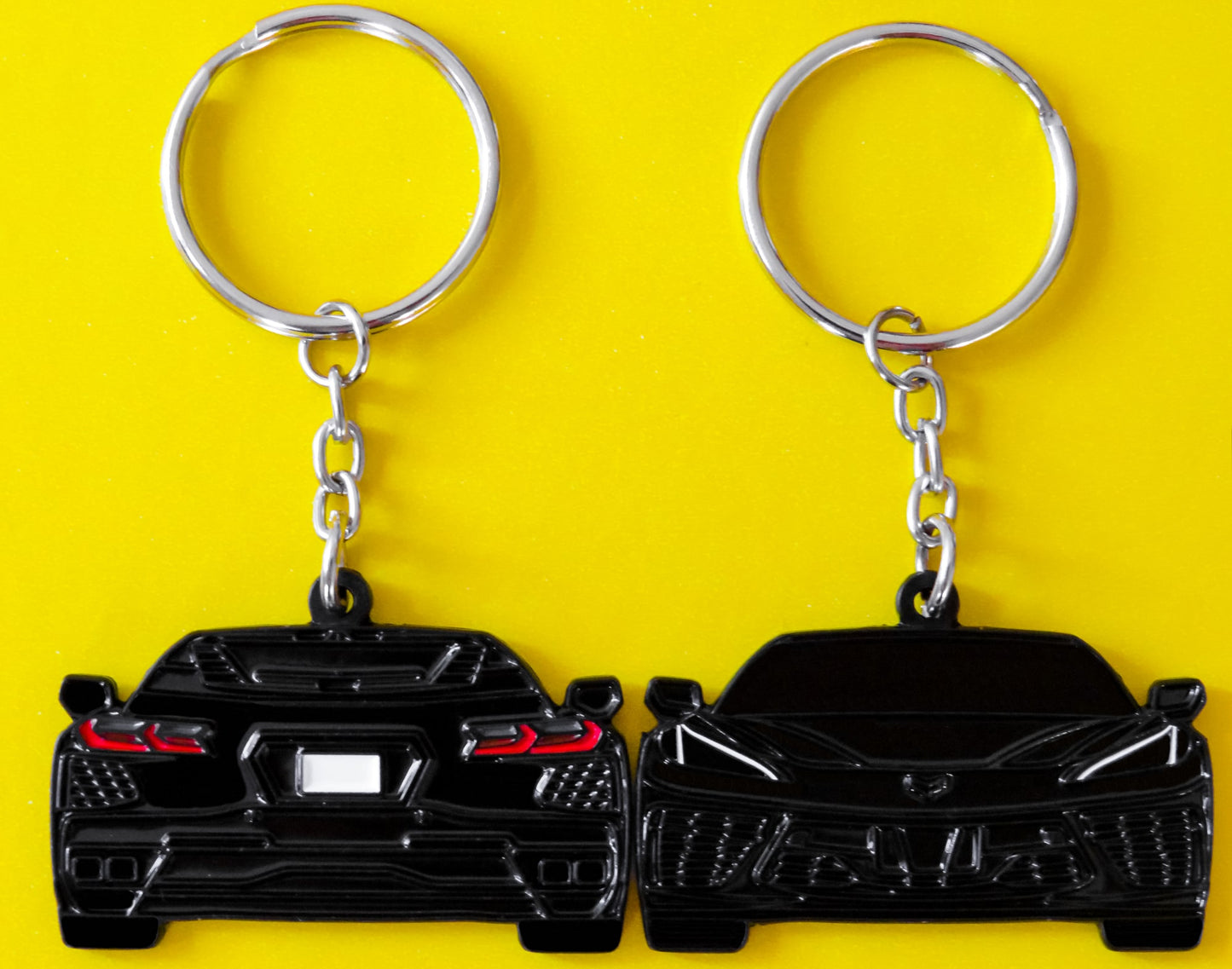 Black Chevrolet Chevy C8 Corvette Stingray Z06 ZR1 Keychain Gift For Car Enthusiasts, Car Guys, Gearheads, Father, Dad, Mother, Mom, Boyfriend, Him, Girlfriend, Her, and more. American muscle car enamel pin patch unique gift idea. Jet tag key ring that fits on a key fob cover for Chevy owners and fans
