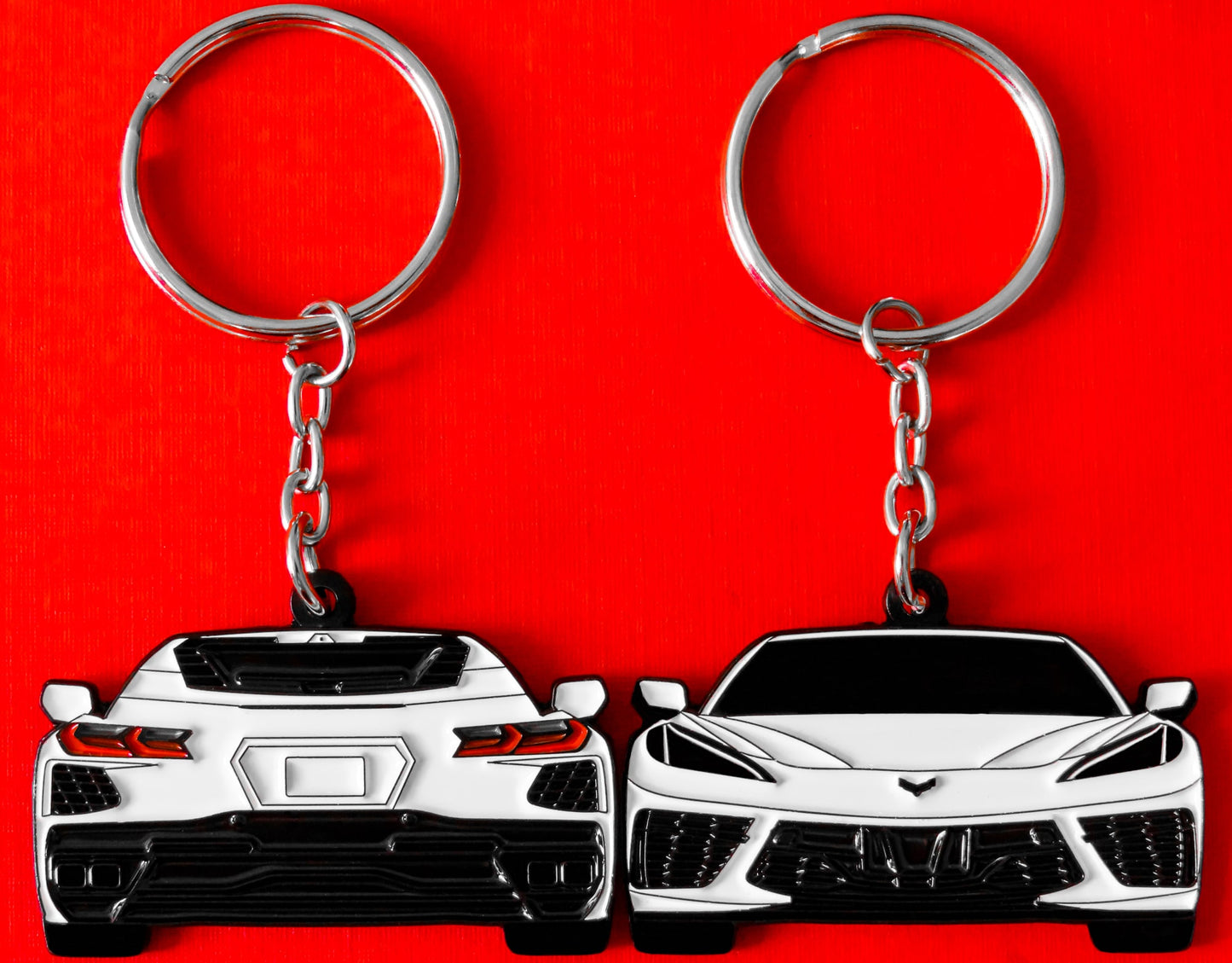 White Chevrolet Chevy C8 Corvette Stingray Z06 ZR1 Keychain Gift For Car Enthusiasts, Car Guys, Gearheads, Father, Dad, Mother, Mom, Boyfriend, Him, Girlfriend, Her, and more. American muscle car enamel pin patch unique gift idea. Jet tag key ring that fits on a key fob cover for Chevy owners and fans