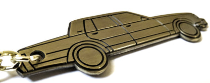 Cool Silhouette Keychain For A Classic Box Chevy Caprice Brougham Donk Lowrider. Great gift for husband mother father dad mom him her boyfriend girlfriend along with car enthusiasts fans and owners. Fits on a key fob and also works well as a keyring and lanyard emblem